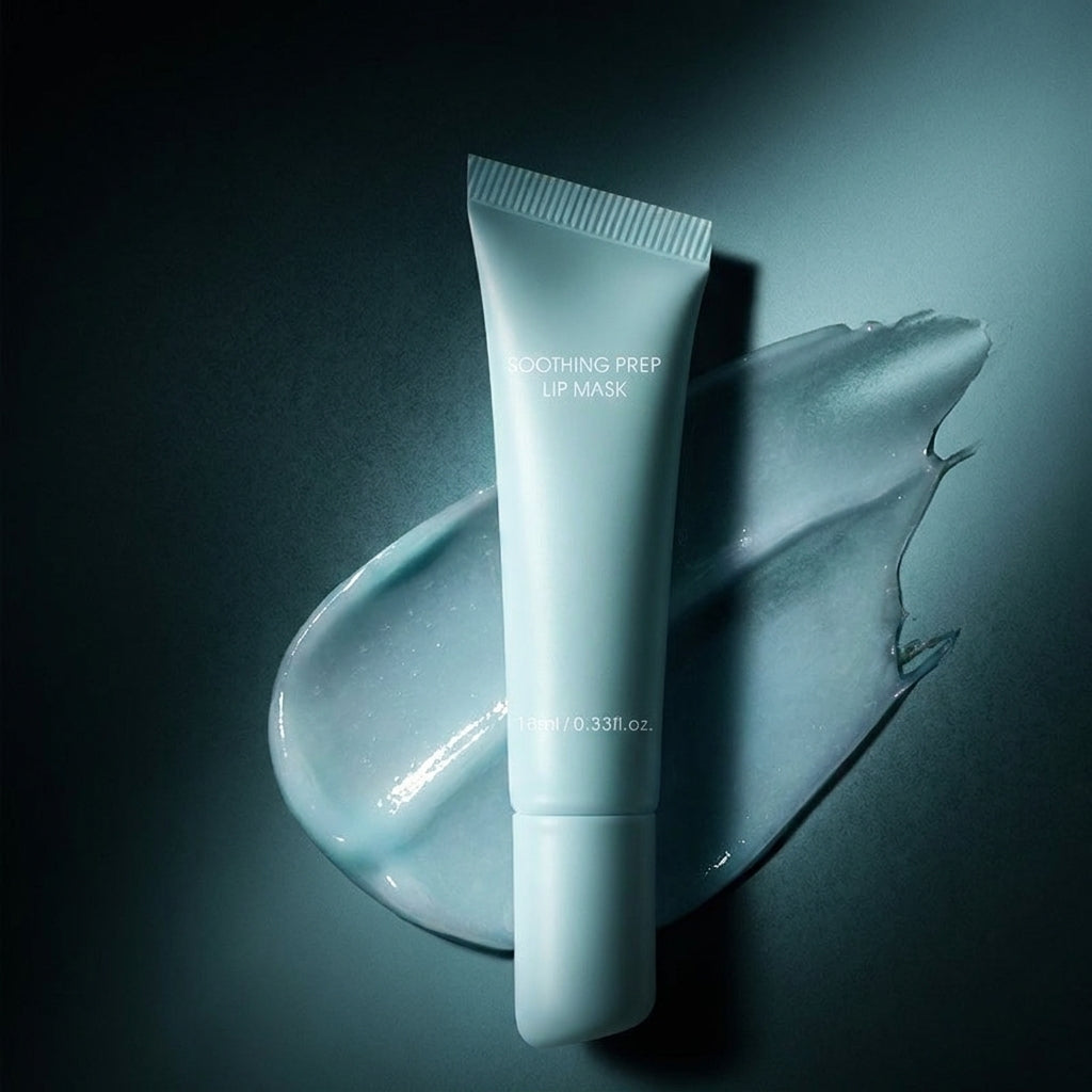 Soothing Peel Off Lip Mask tube in dramatic lighting against a dark teal-green background with a gel swipe
