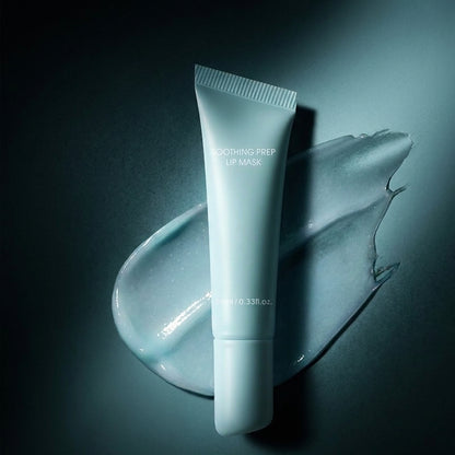 Soothing Peel Off Lip Mask tube in dramatic lighting against a dark teal-green background with a gel swipe